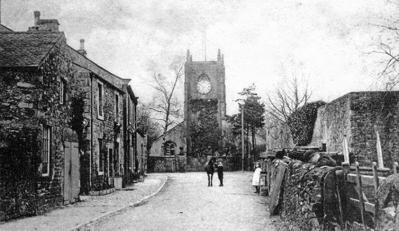 Church Street early 1900s.jpg - Church Street in the early 1900's. Wm Ward's workshop is on the right. Note the constabulary sign on the house wall at left.